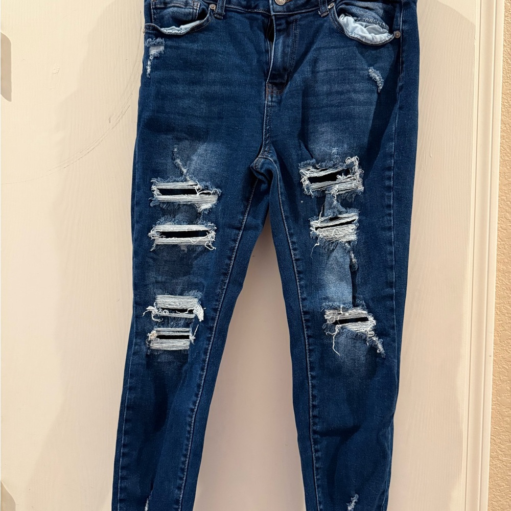 Blue Skinny Jeans with Distressed Detailing